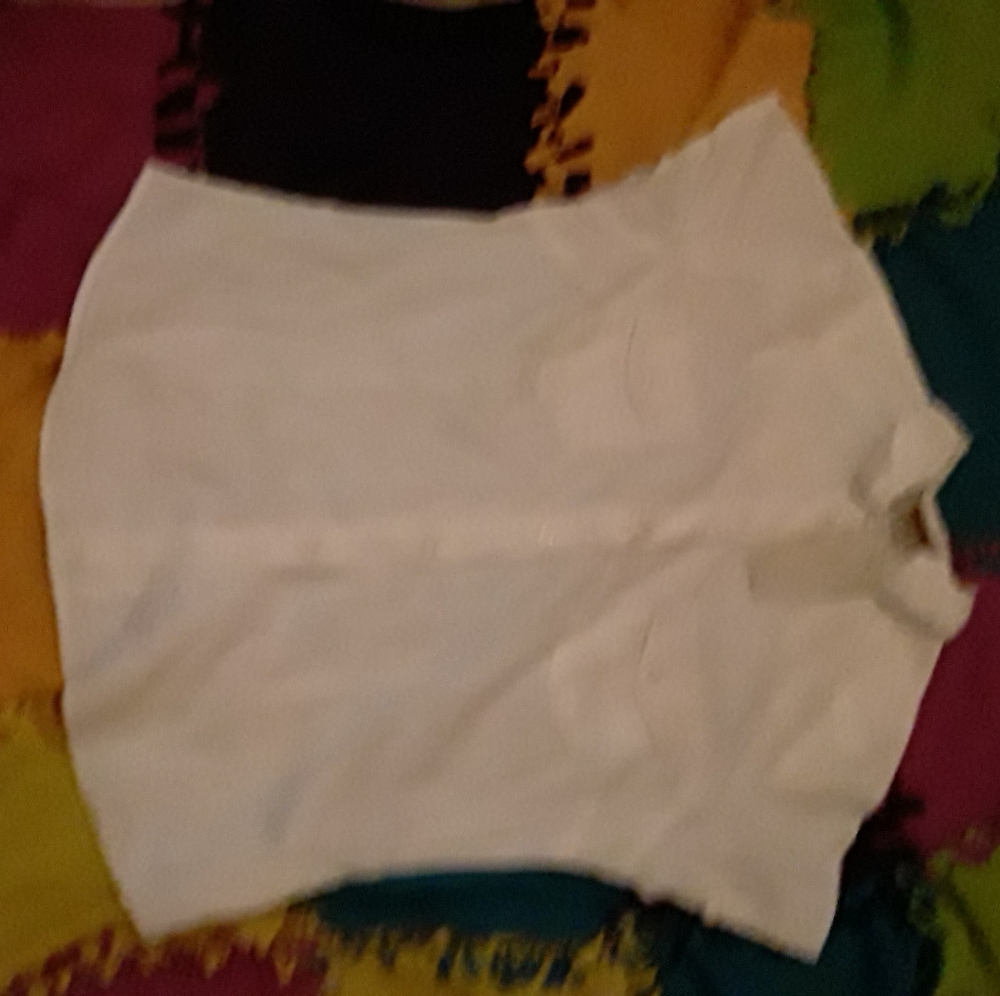 White shirt tags still on it